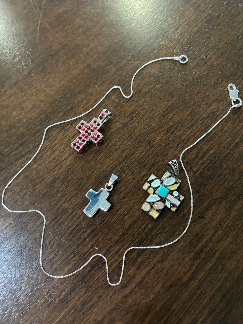 Silver Cross Pendant Necklace with Multicolor Inlay and Red Crystal Accent